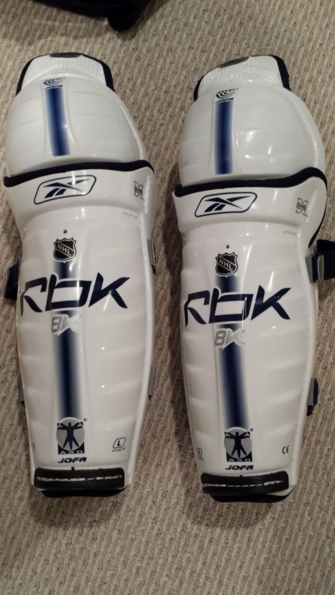 SOLD, LOCK: 16" Reebok Shin Pads - Protective Gear For Sale - Pro Hockey - Sports2k.com